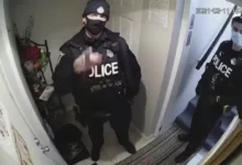 Police officers confront tenant during 2021 dispute caught on camera.